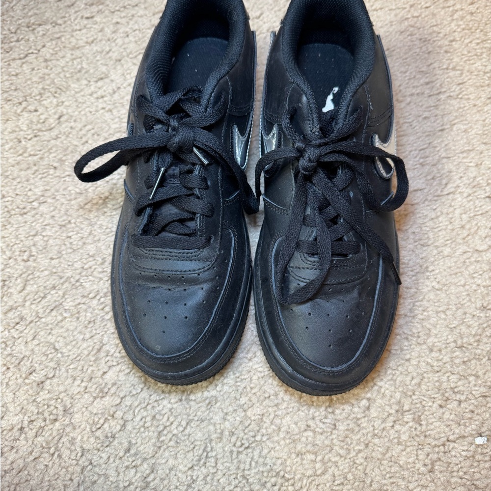 Nike Black Sneakers with Silver Accents